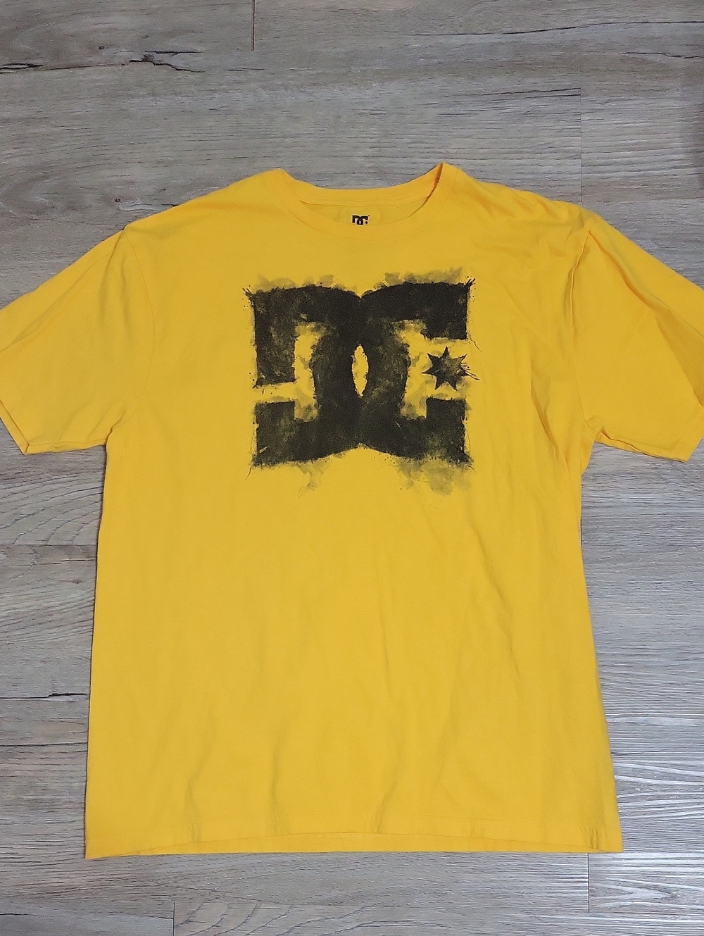 DC Yellow Tee with Distressed Black Logo